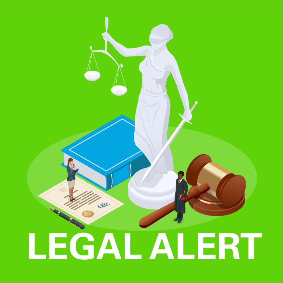 Legal alert document, gavel, book, and statue